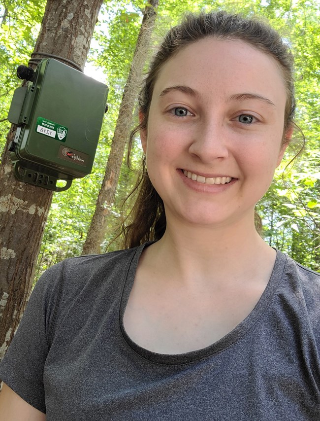 woman standing front of a tree with an ARD