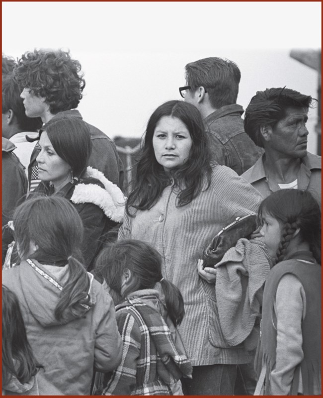 Woman and children among crowd going to Alcatraz