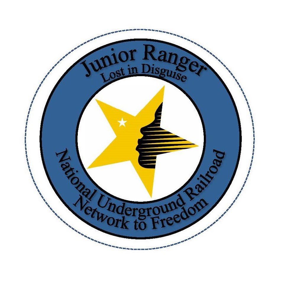 A blue circle with the words Junior Ranger Lost In Disguise National Underground Railroad Network To Freedom encircles a white field with a yellow star that has a black lined face within.