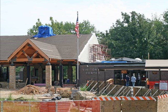 Mammoth Cave Visitor Center construction Equipment in front of construction in progress at Mammoth Cave Visitor Center.