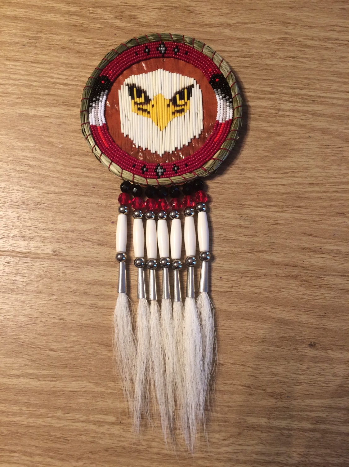 Mario Harley Pendant Pendant with eagle decoration and fringe made of bone and deer hair.