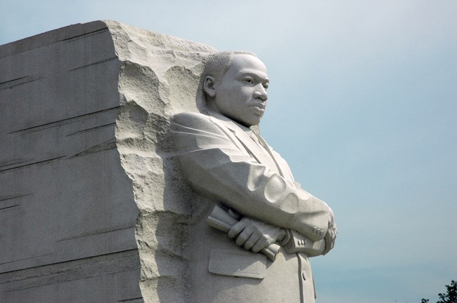 A granite statue of Dr. Martin Luther King, Jr.