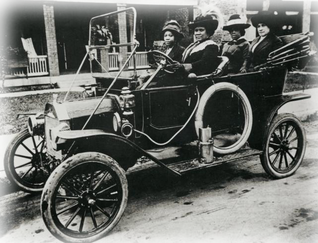 Four women riding in a car