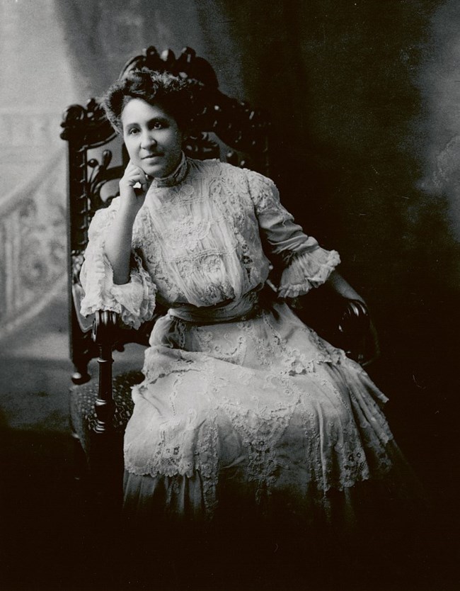 Seated black and white image of Mary Church Terrell