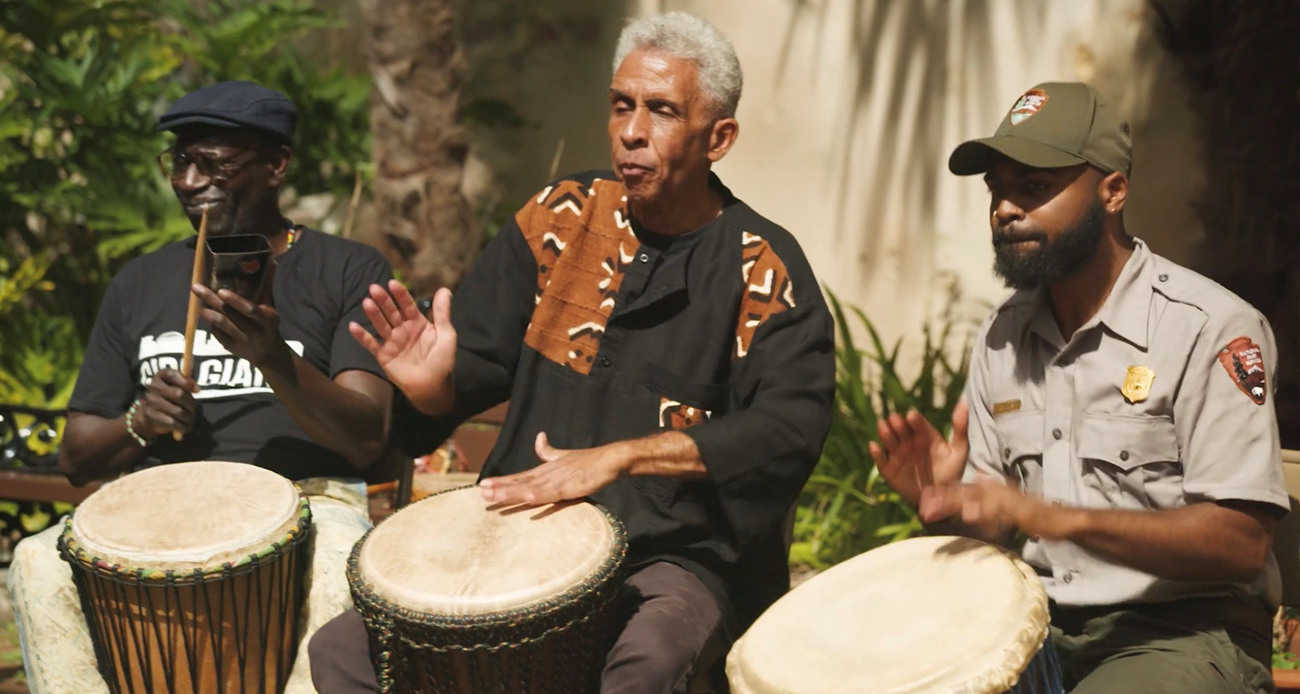 Hunter assisting children with drum lessons  during his internship in the NOLA Jazz Location