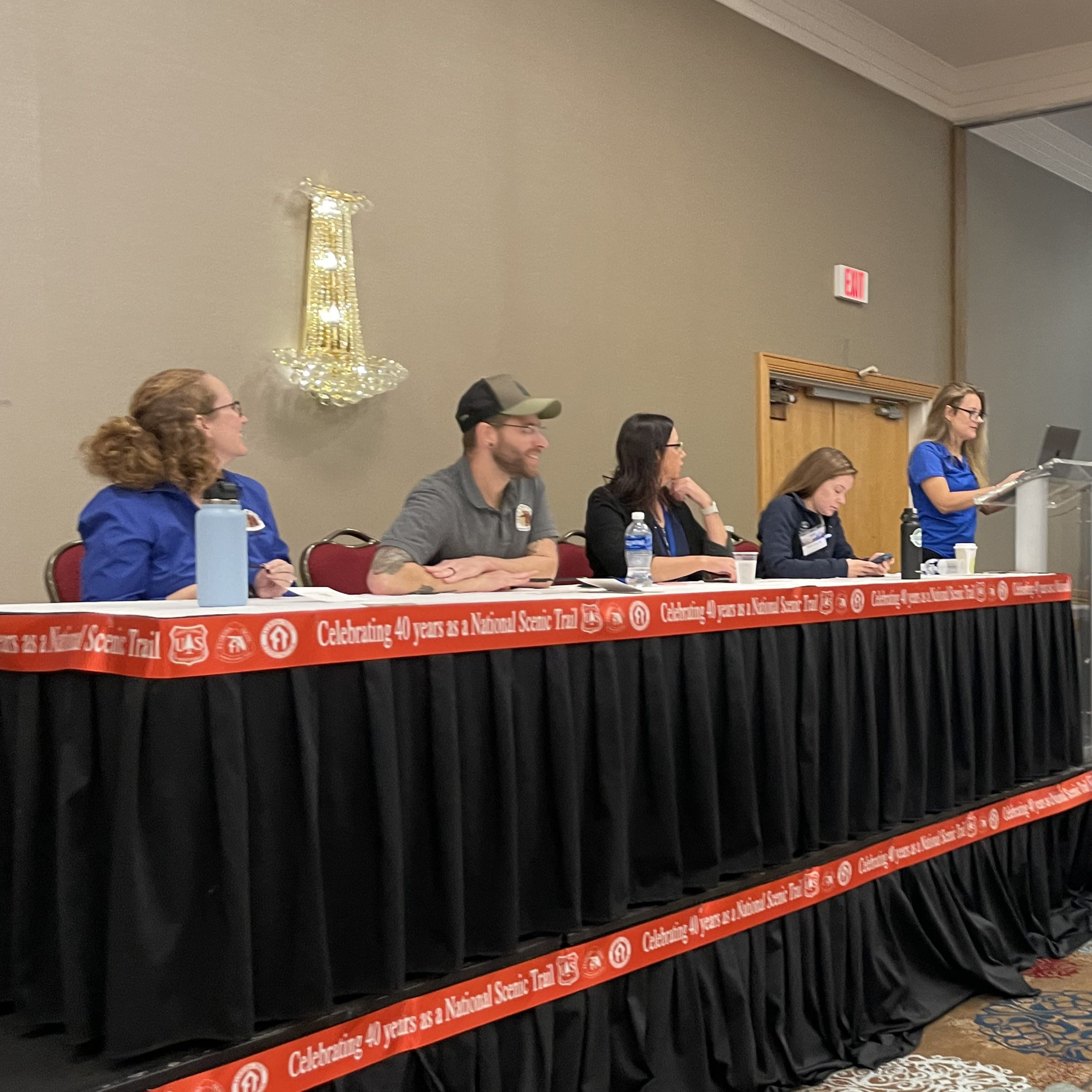 five people at a panel table