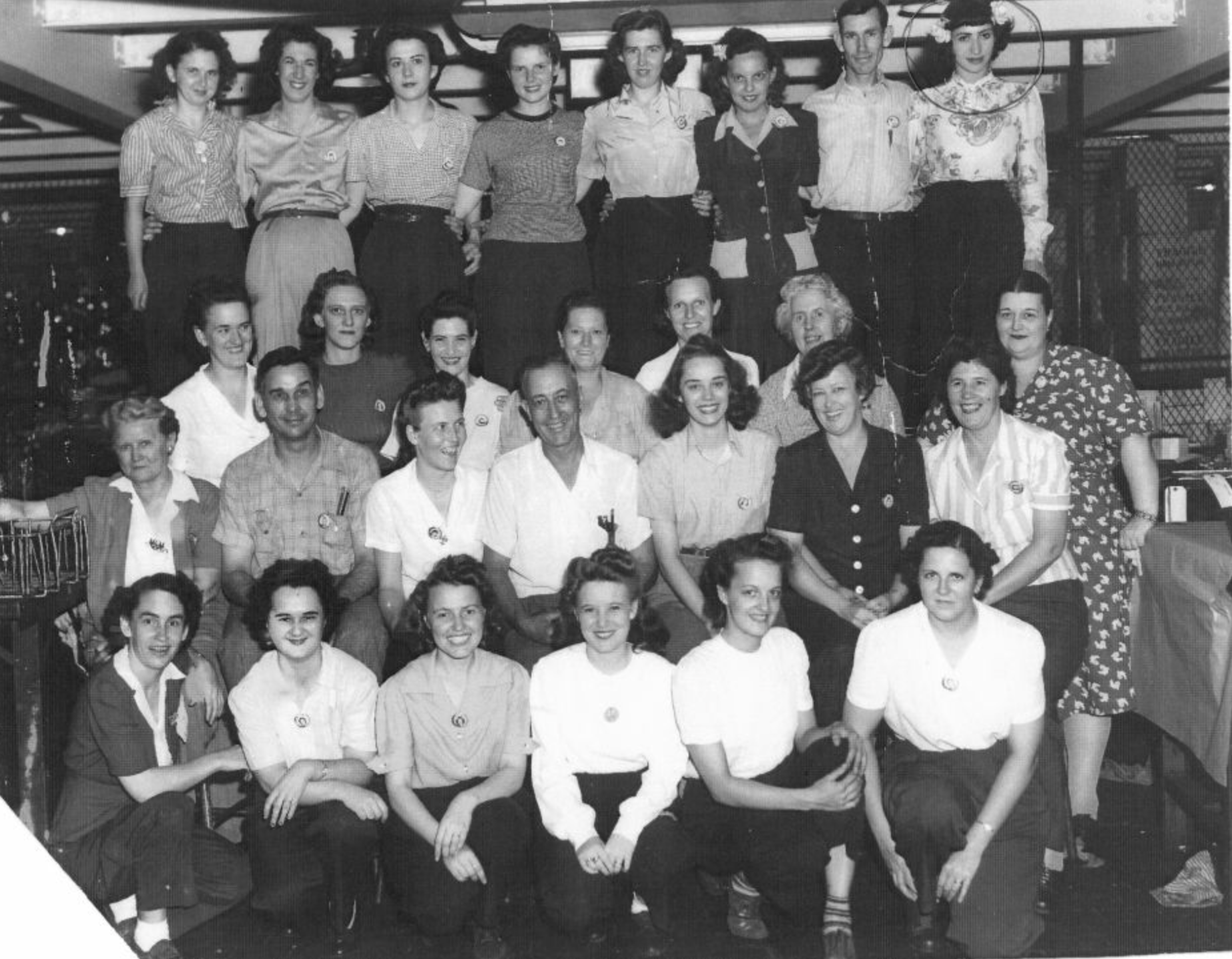 Mignon Sherer and fellow workers A historic photo of a group of women factory workers from the 1940's.