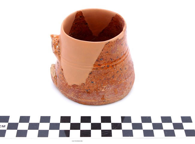 Red glazed ceramic mug