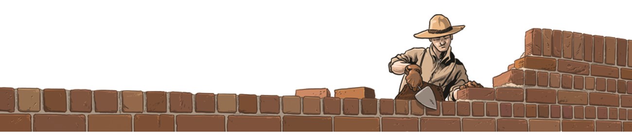 A mason wearing a broad rimmed hat building a brick wall.