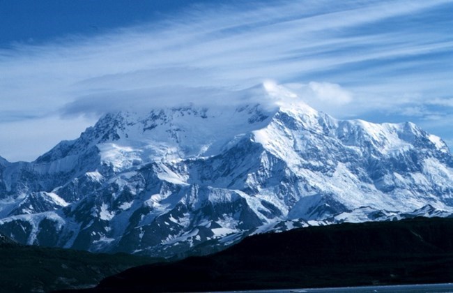 Tall snow covered mountain.