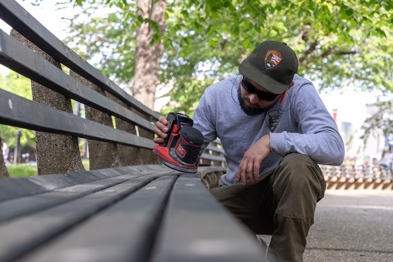 National Park Service Staff fixes benches at Dupont Circle in Washington, D.C., April 15, 2026.