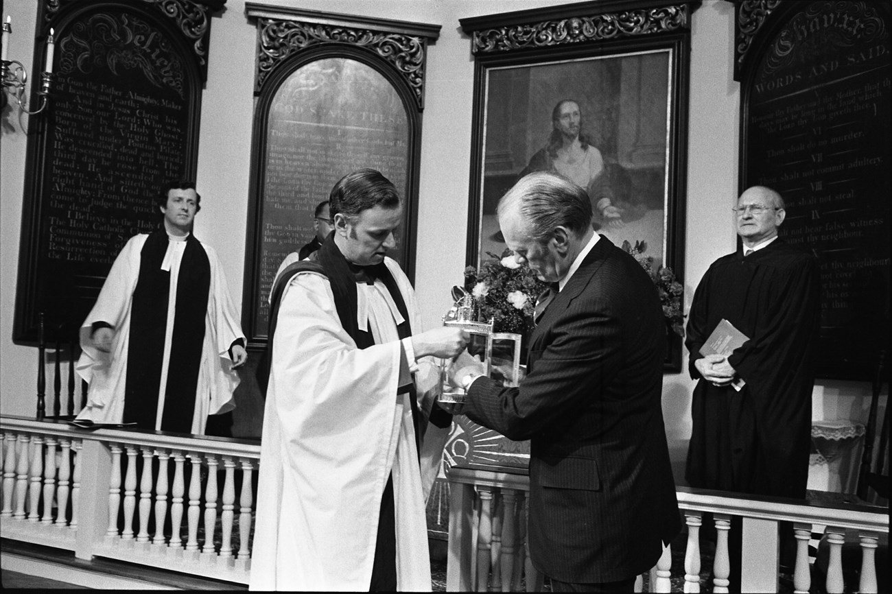 President Ford lighting a lantern in Old North Church.