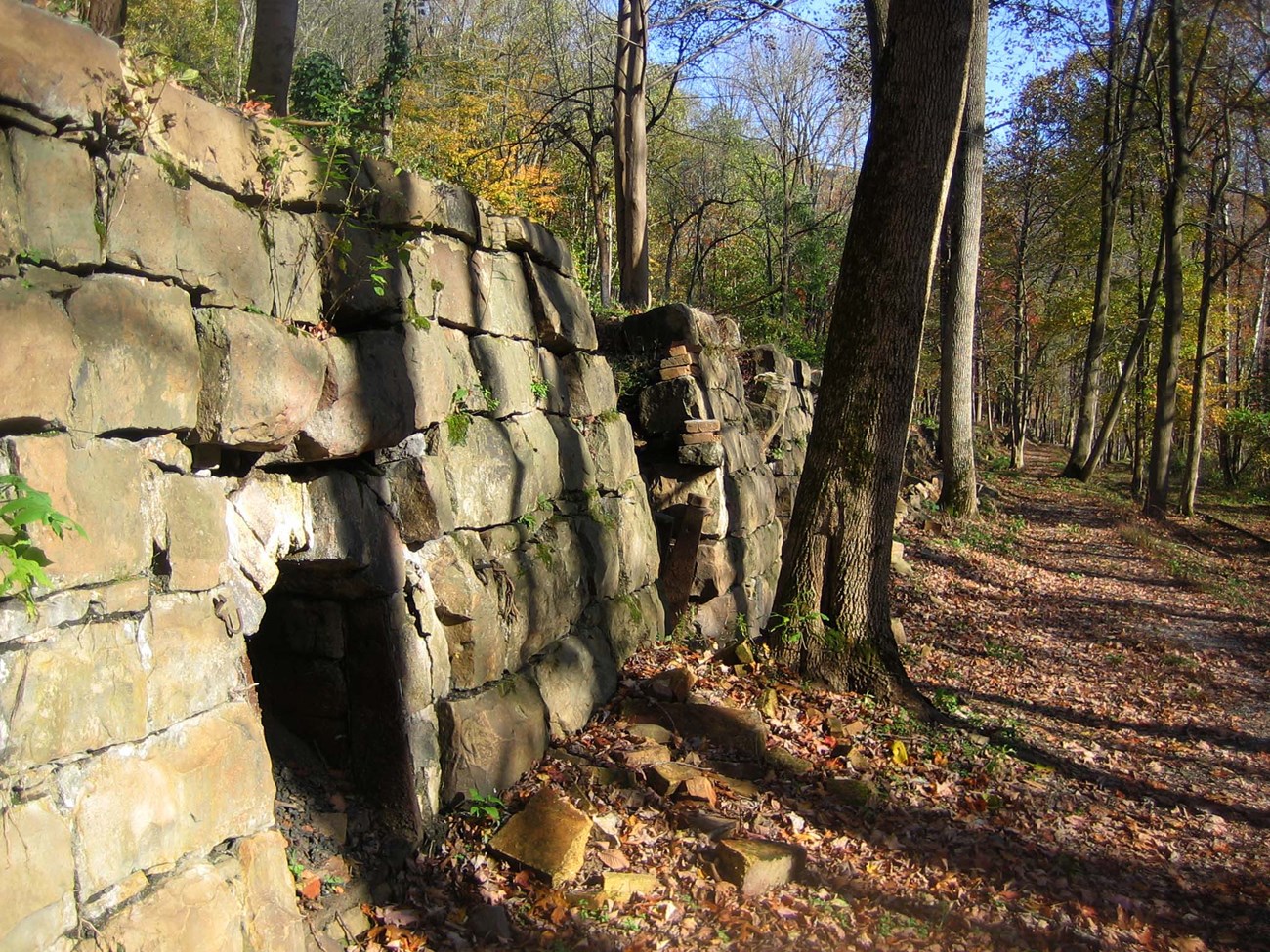 stone feature with an opening in it