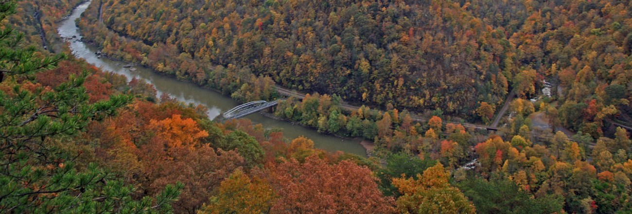An overlook view of fall foliage and the New River. An overlook view of fall foliage and the New River.