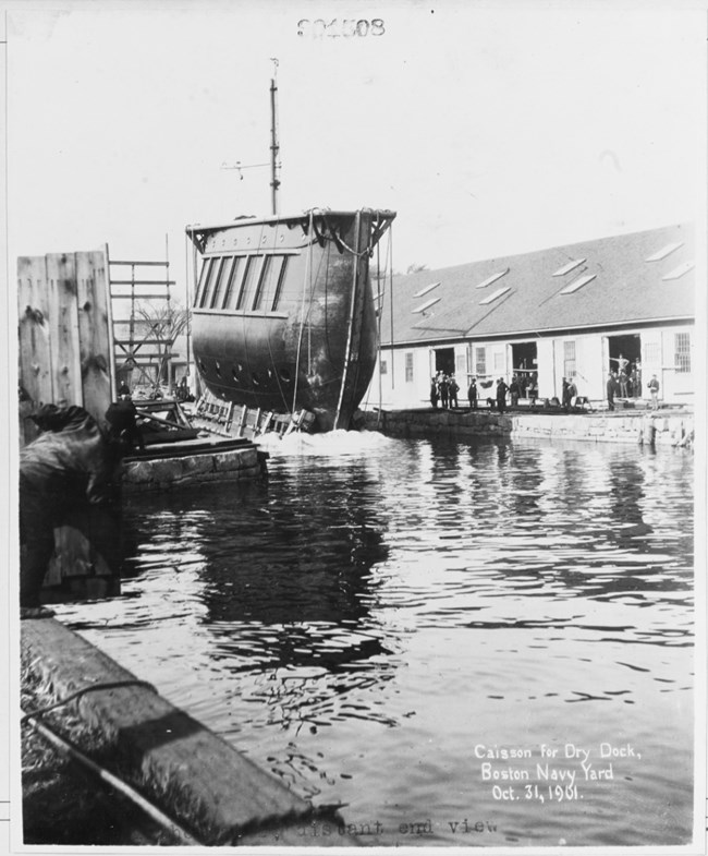 caisson of Dry Dock 1, large slabs with a wooden hull