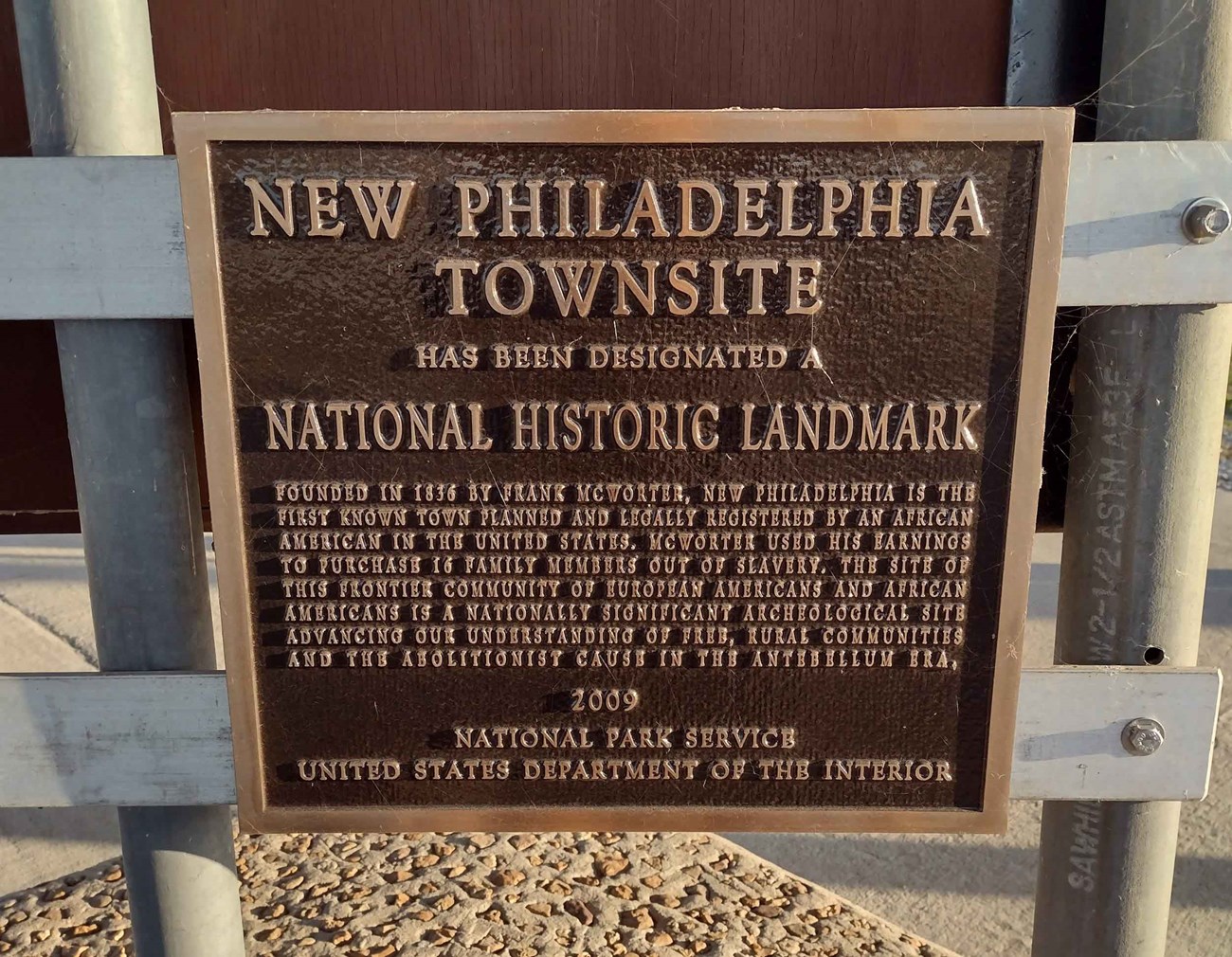 Photograph of a National Historic Landmark plaque for New Philadelphia.