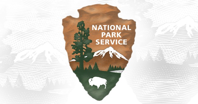 Brown arrowlead logo, saying National Park Service