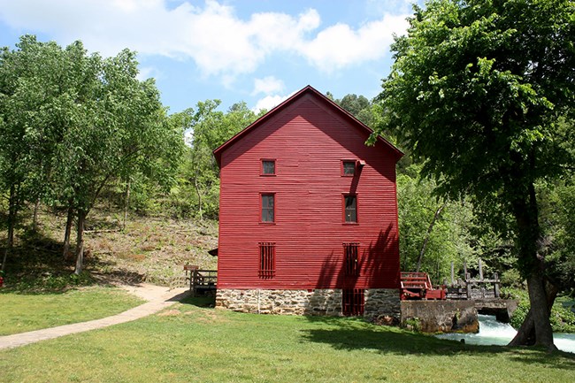 Alley Spring Mill protected by prescribed fire at Ozark National Scenic Riverways. Alley Spring Mill protected by prescribed fire at Ozark National Scenic Riverways.