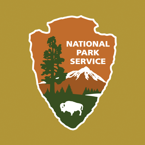 NPS arrowhead with gold background