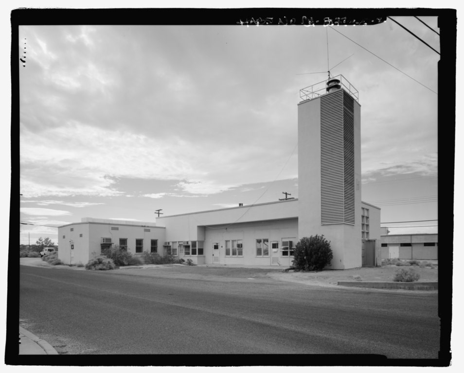 A black and white photo of an industrial building.