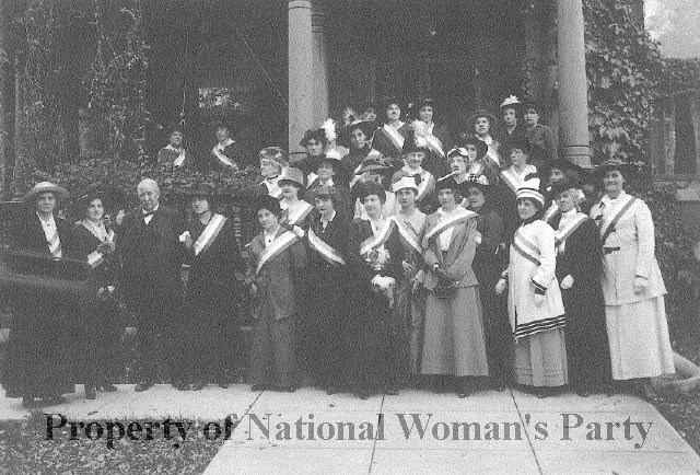 A group of women post for a photo. Coll National Womans Party