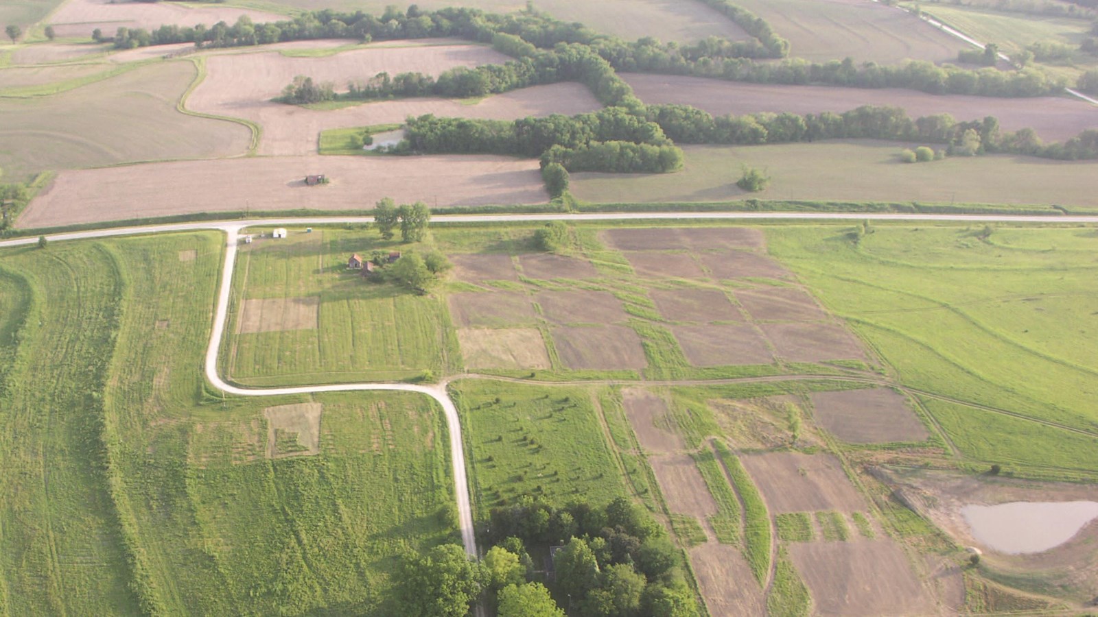 Aeriel view showing what remains of the New Philadelphia town site today Aeriel photo of New Philadelphia featuring a field with one road