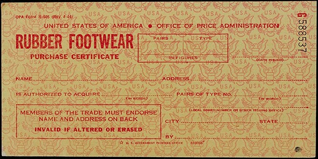 Printed in red on yellow with red security printing of the Great Seal of the United States. Spaces for the name and address of the purchaser, how many pairs of what type, and information about the issuing rationing board. Serial number in upper right.