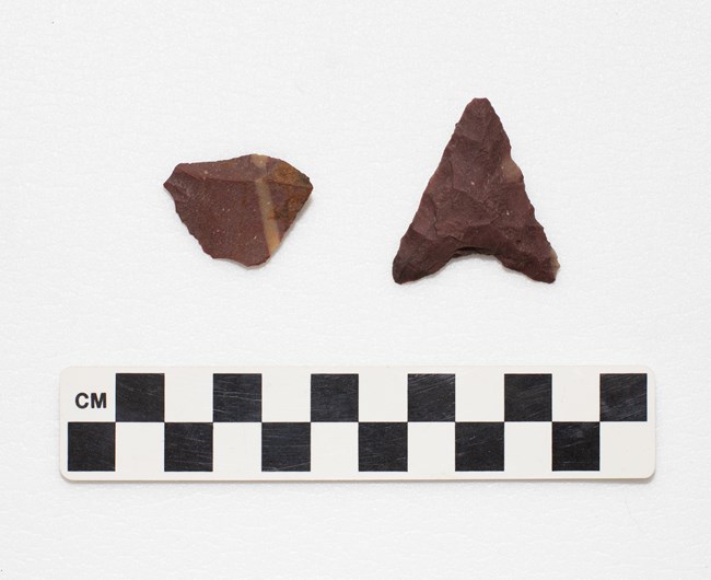 Triangular shaped projectile point with concave base A triangular shaped projectile point with concave shaped base.