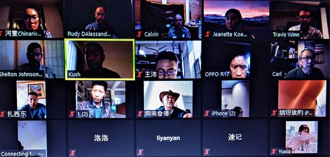 screenshot of a video teleconference with the participants photos arranged in a grid