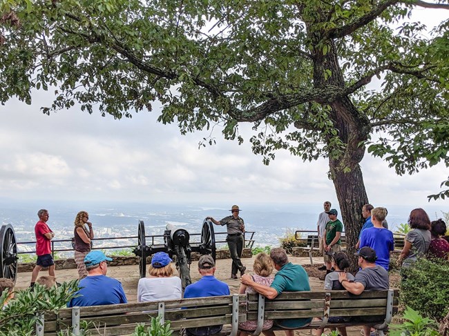 Ocmulgee Mounds Ranger Speak to Group of Park Visitors