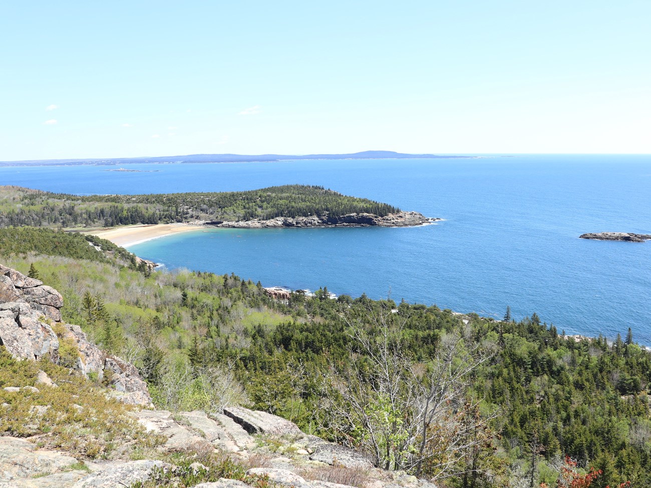 Ocean beach with a small offshore island