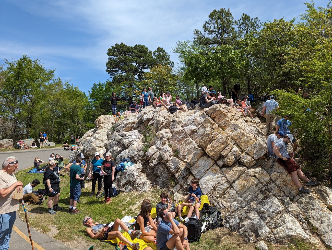 HOSP eclipse West Mountain A small crowd gathers on a rock outcropping for eclipse viewing