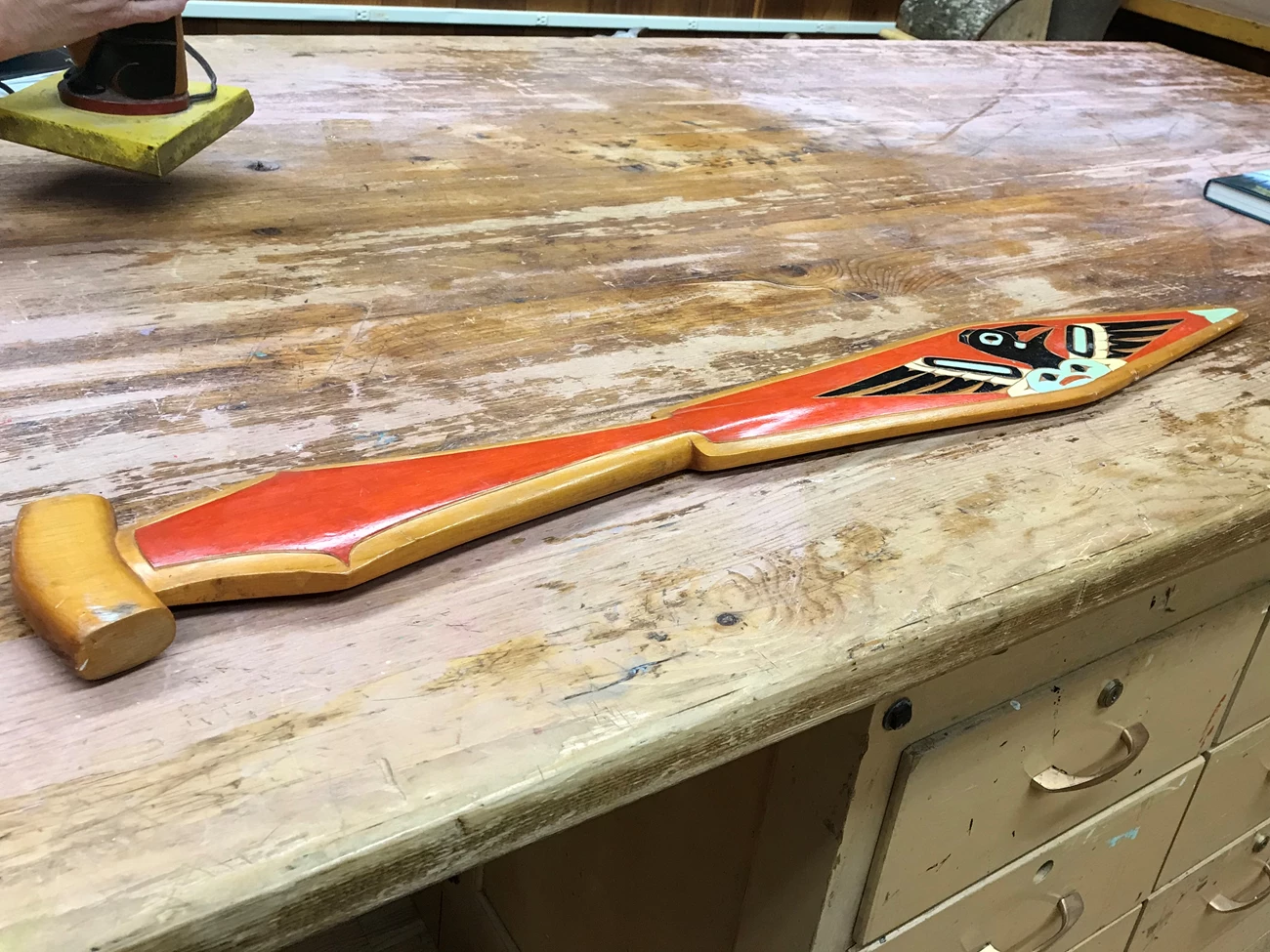 Paddle carved by George Benson for his daughter. A paddle carved and painted with Northwest Coast style designs