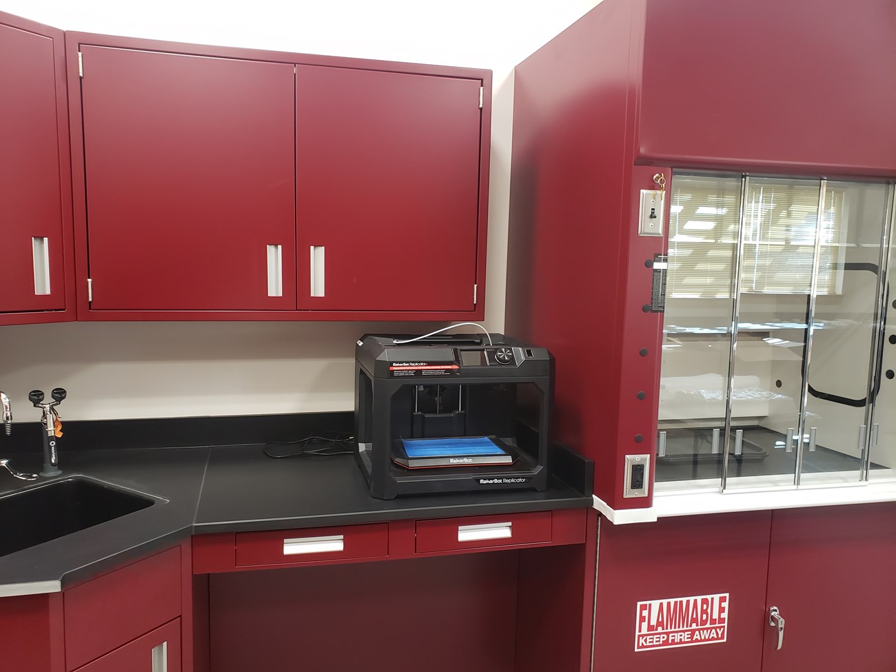 photo of a fossil lab with cabinets and work bench