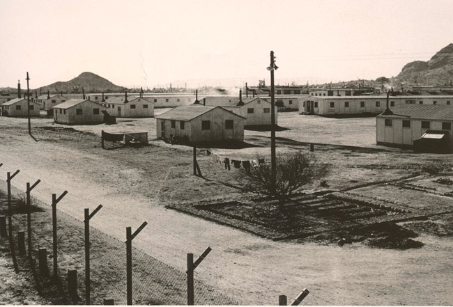 Papago Park Compound, Tempe, AZ Black and white photograph of papago park prisoners of war camp, with housing structures and a laundry wire.