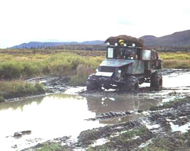 An ATV in the mud.