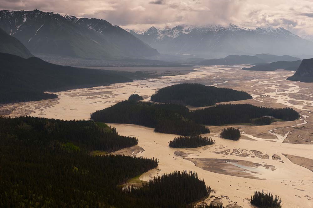 Photo 9_Chitina River (NPS photo)_web A braided river between mountains.