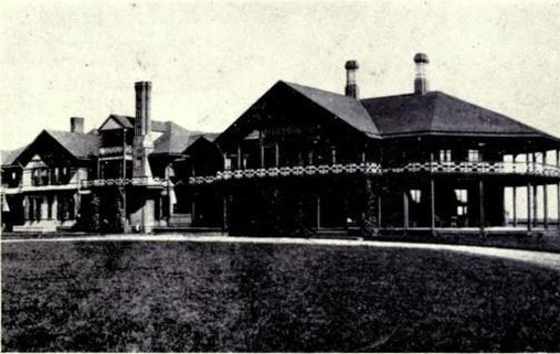 a black and white picture of a hotel