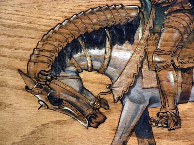 DESO 77 (detail) A close-up detail of a mural by artist Dan Feaser showing a procession of Spanish soldiers wearing historically accurate armor and marching in procession with horses.