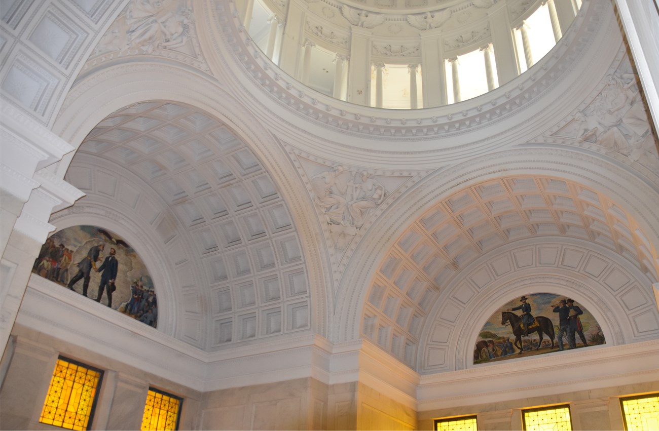 Interior view of Mosaics in General Grant National Memorial White round walls with different ornamental detail and a domed ceiling