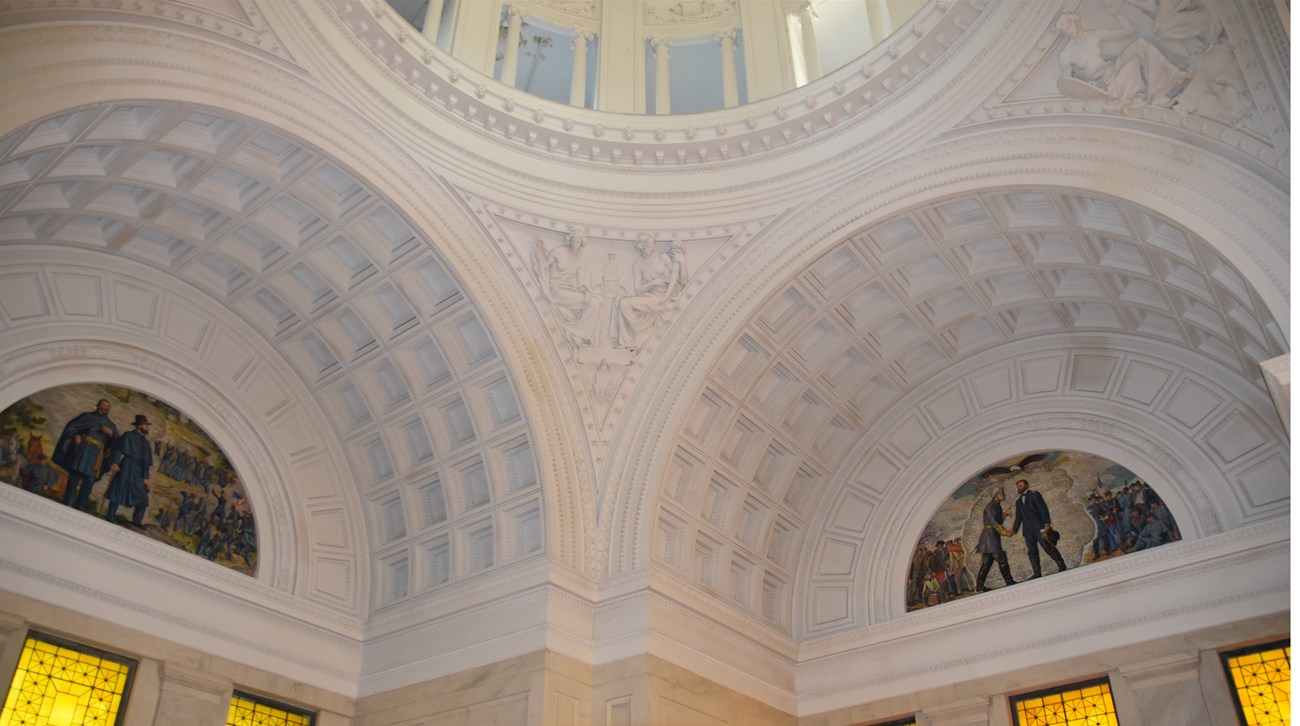 Interior view of General Grant National Memorial mosaic art White round walls with different ornamental detail and a domed ceiling