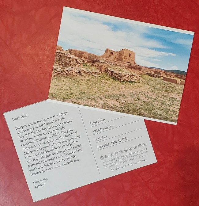 Postcard Activity Photo - Front and Back Two postcards. One showing the front with a photo of an adobe ruin on it. The second with a message about the Santa Fe Trail.
