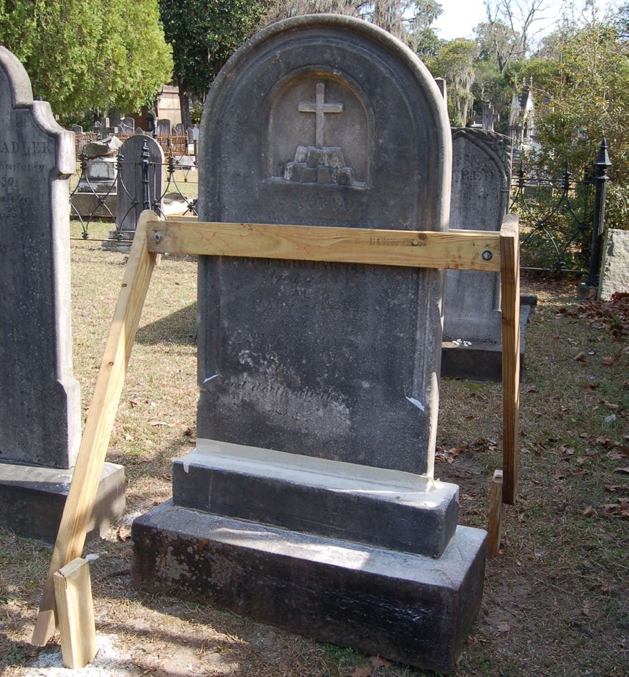 5 foot tall stone monument stabilized with temporary wood bracing to keep it in the upright position 5 foot tall stone monument stabilized with temporary wood bracing to keep it in the upright position