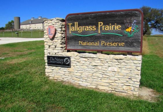 Limestone sign at entrance to park with partner logos