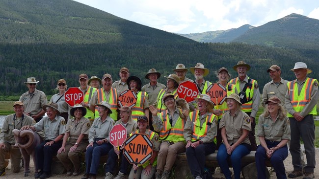 A group photo of volunteers next to each other at Rocky Mountain National Park.