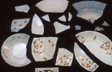 A series of plate fragments set against a black background.
