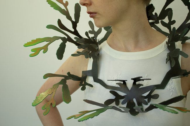 Portrait of the artist with wearable sculpture Portrait of the artist with wearable sculpture