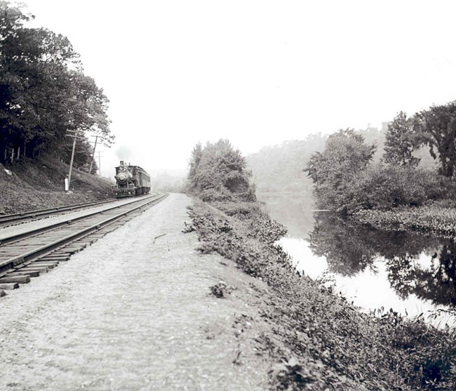 Providence and Worcester Railroad locomotive on track adjacent to the Blackstone Canal