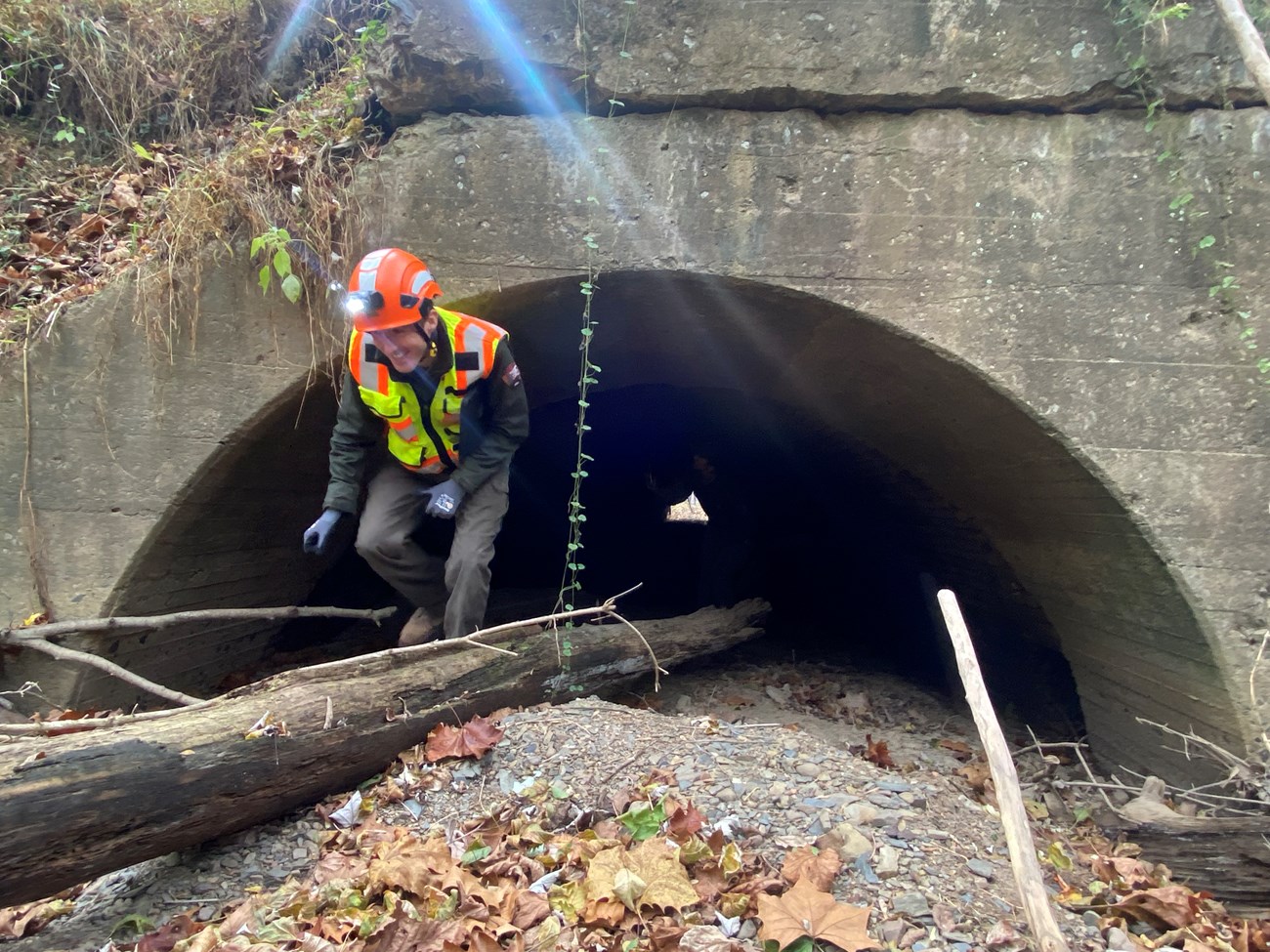 Civil Engineer Joe Reed Man emerges from a tunnel.