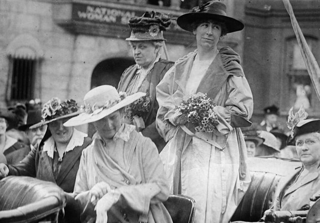 Photo of women in a car outside NAWSA headquarters LOC